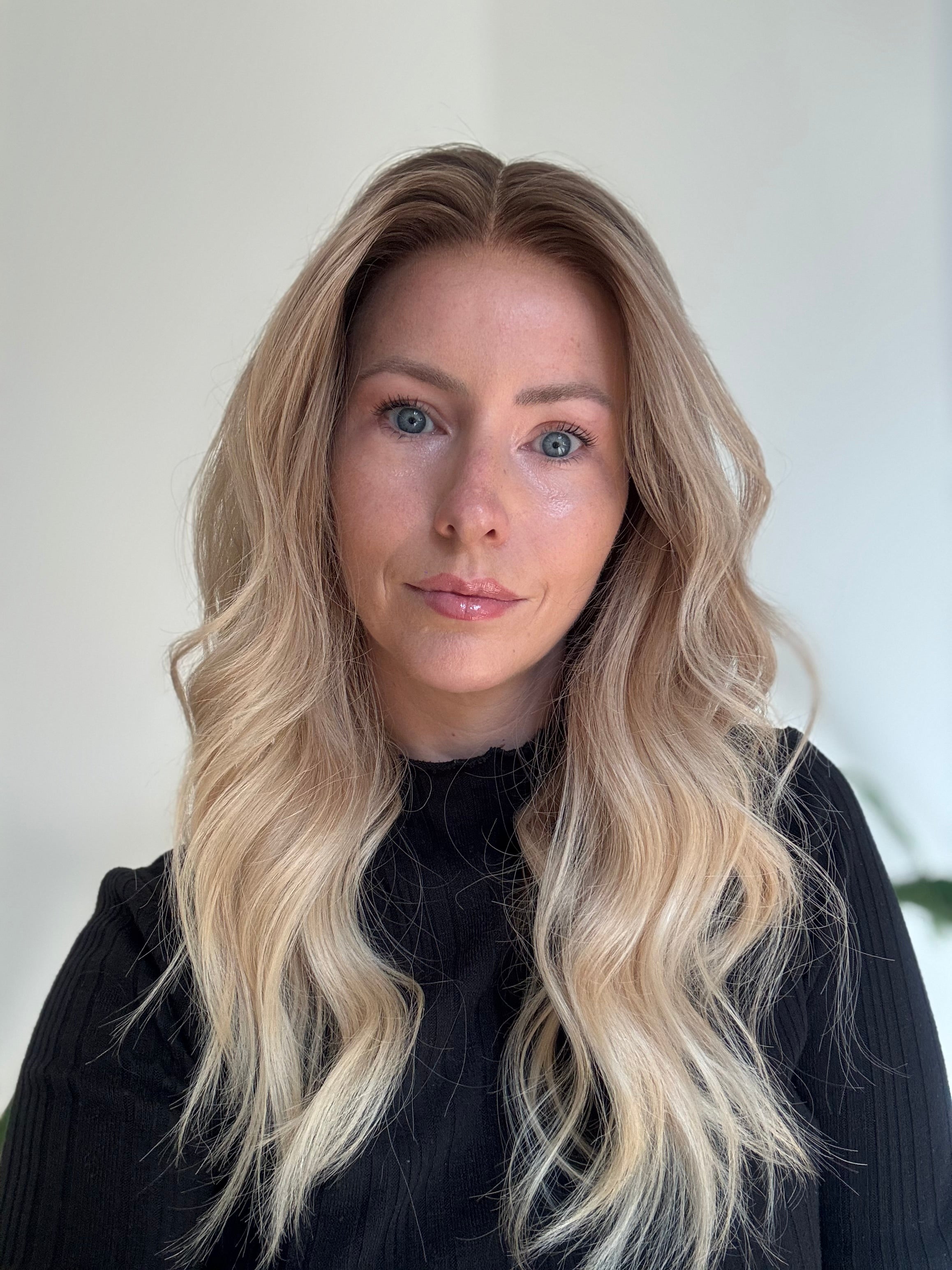 Blonde 22 inch human hair wig with natural roots and soft waves