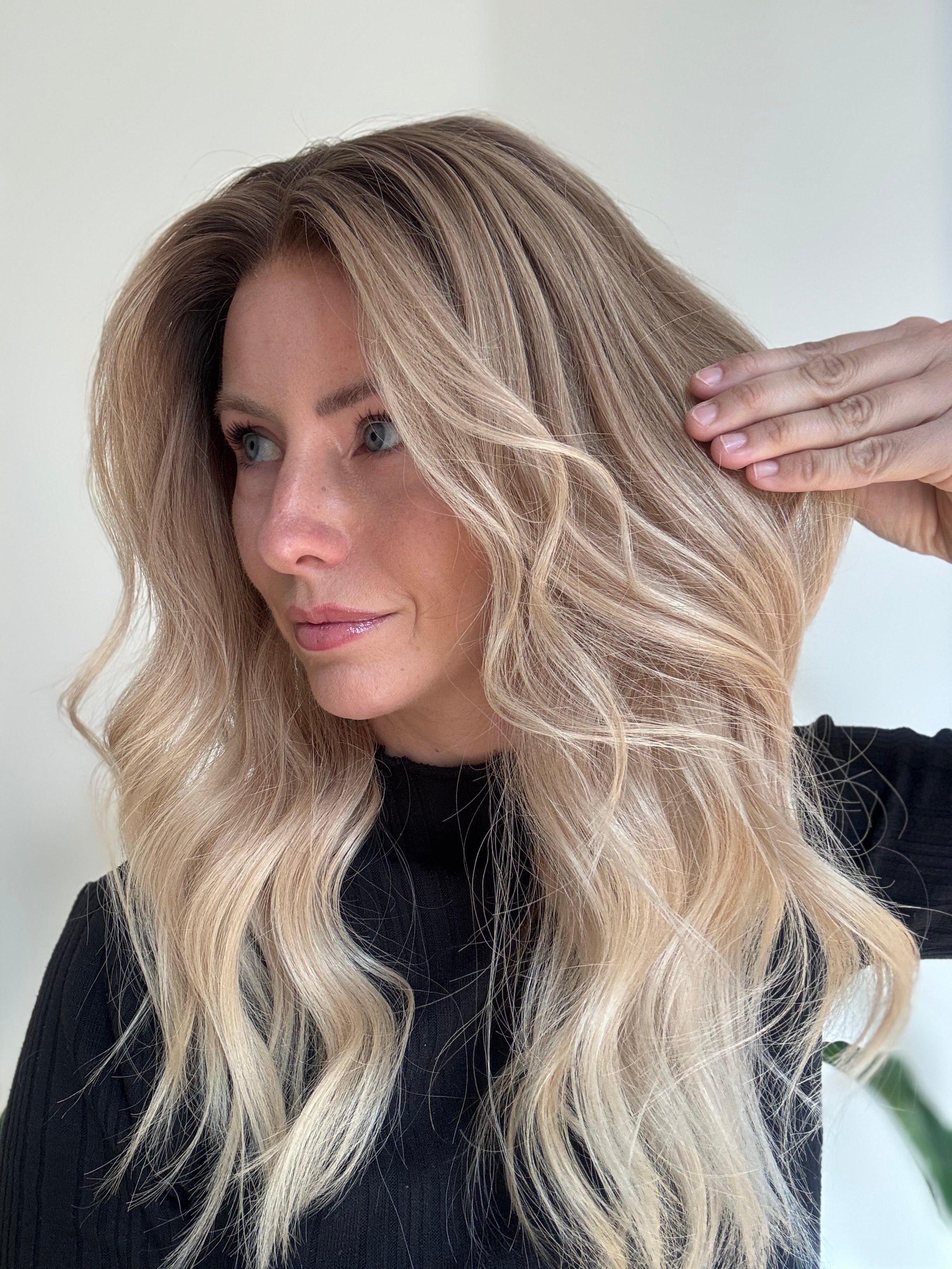 Side view of blonde human hair wig with dimensional blonde colour