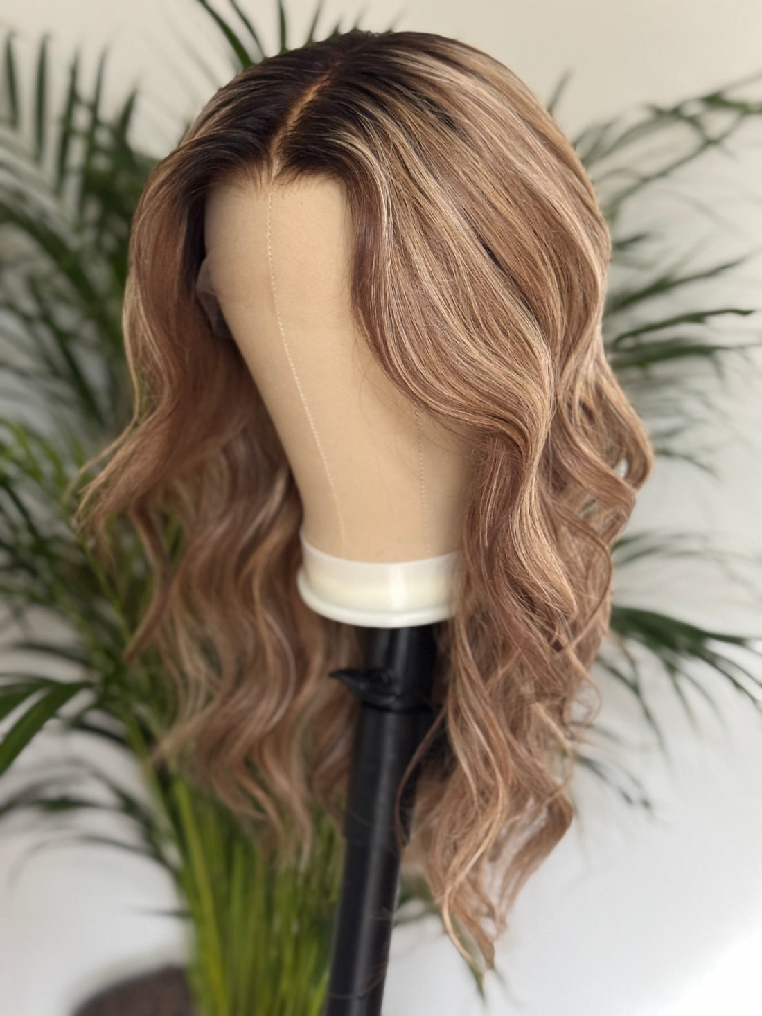 Side view of brown balayage lace front human hair wig with blonde highlights