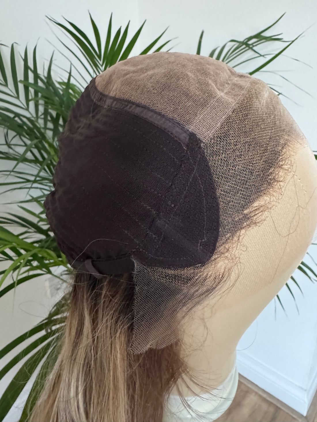 Glueless human hair wig cap construction designed for a secure natural fit