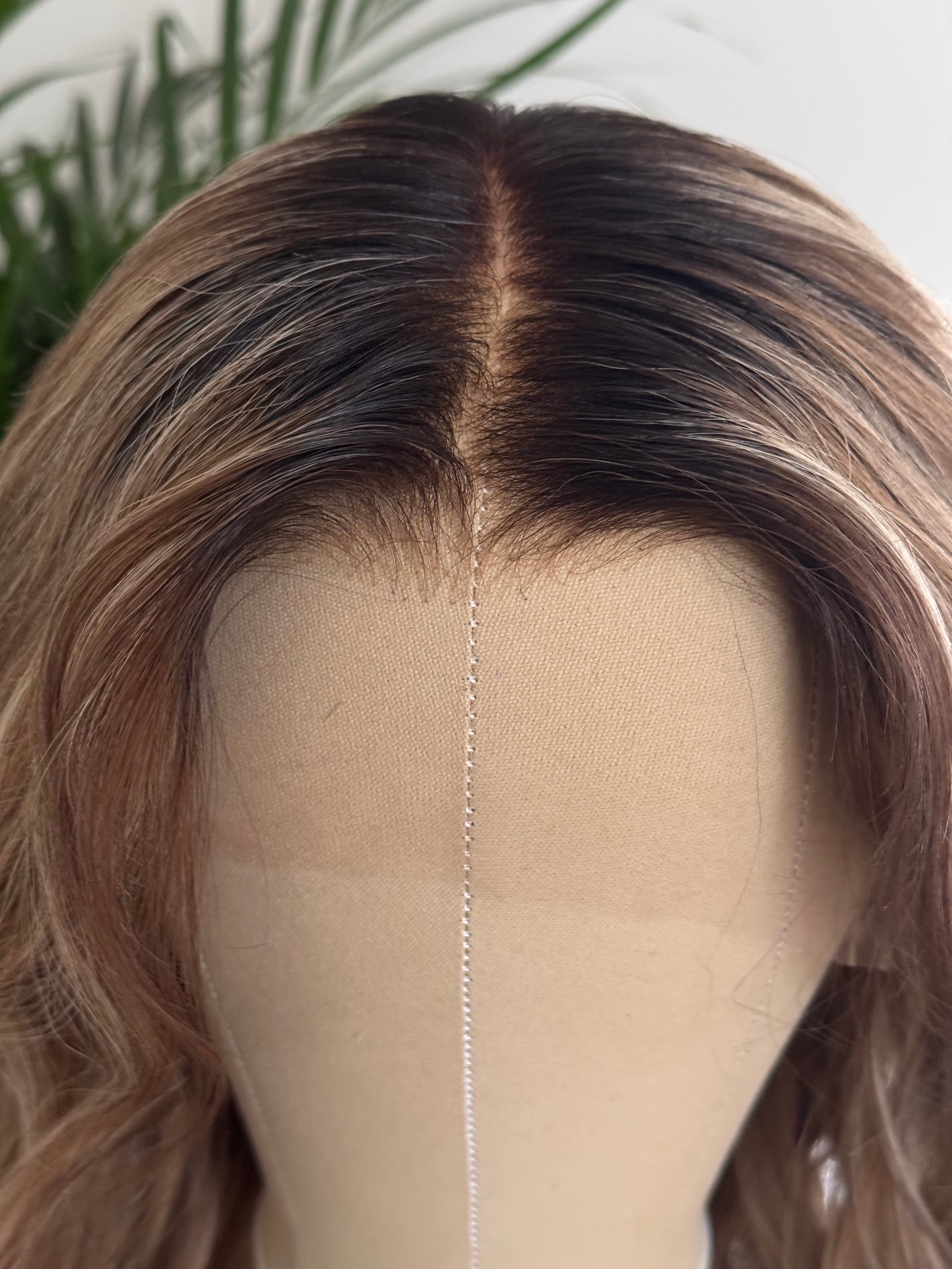 Close up of natural hairline on brown blonde balayage human hair wig